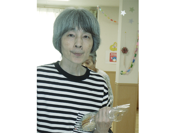 写真：利用者様とスタッフ