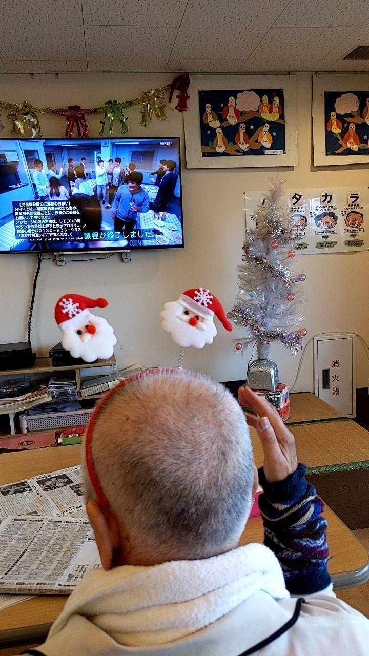 写真：利用者様とスタッフ