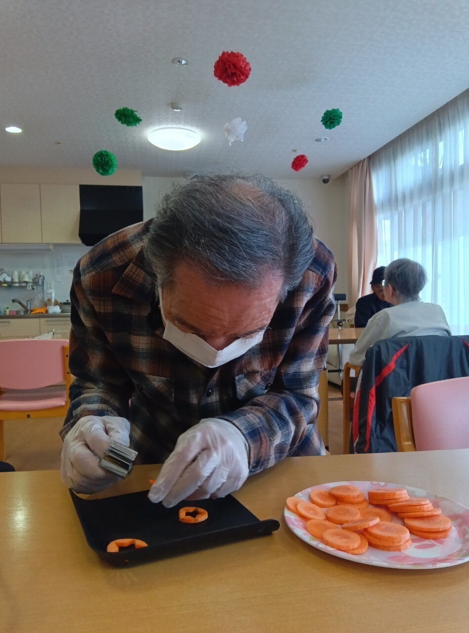 写真：利用者様とスタッフ