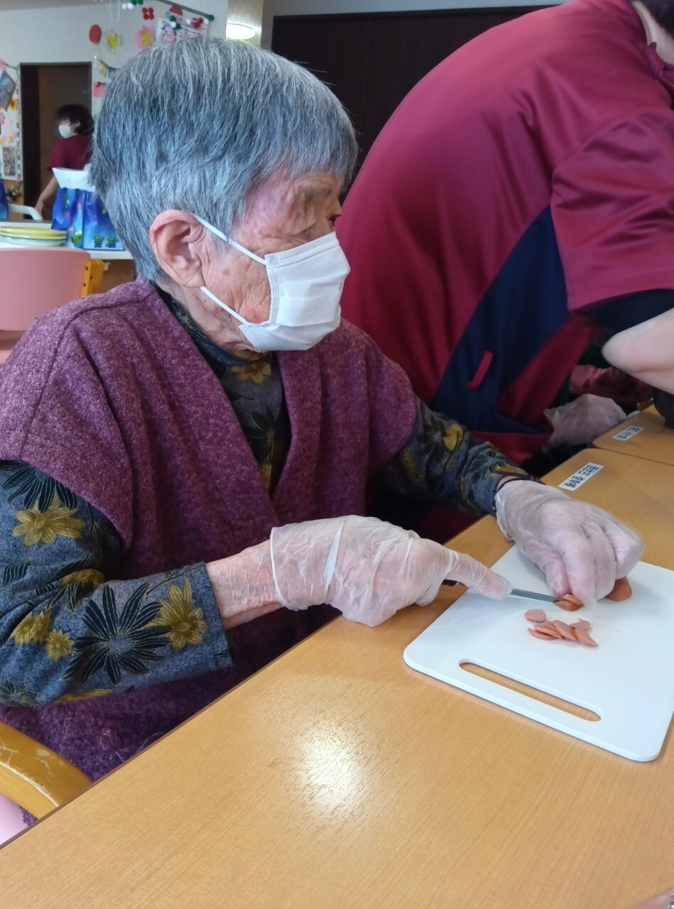 写真：利用者様とスタッフ