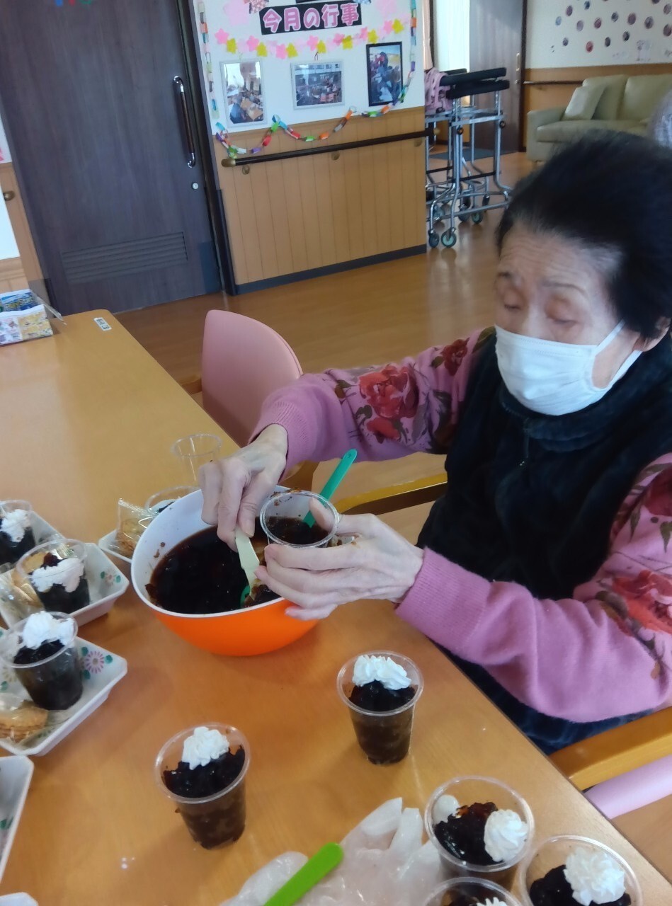 写真：利用者様とスタッフ