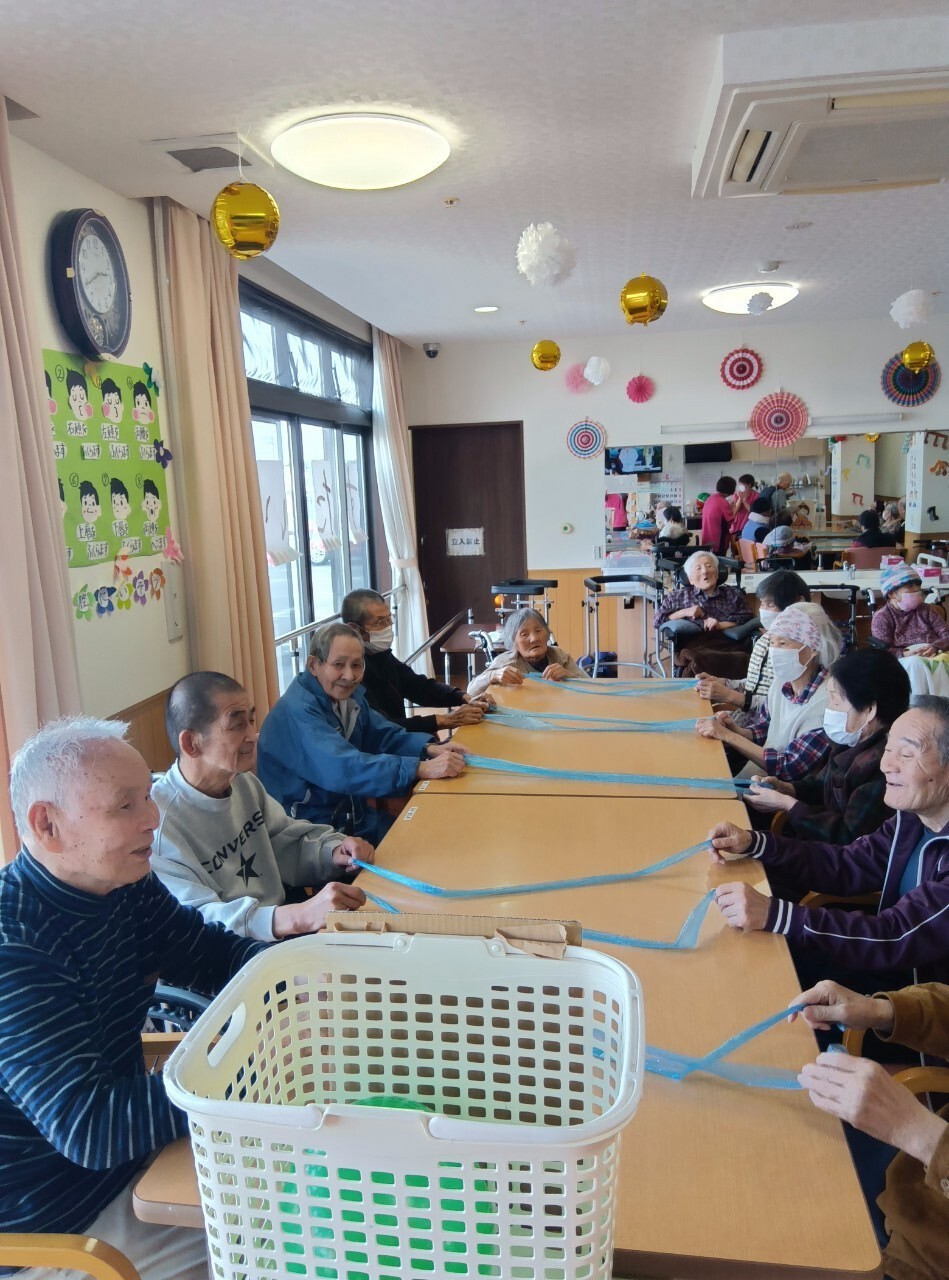 写真：利用者様とスタッフ