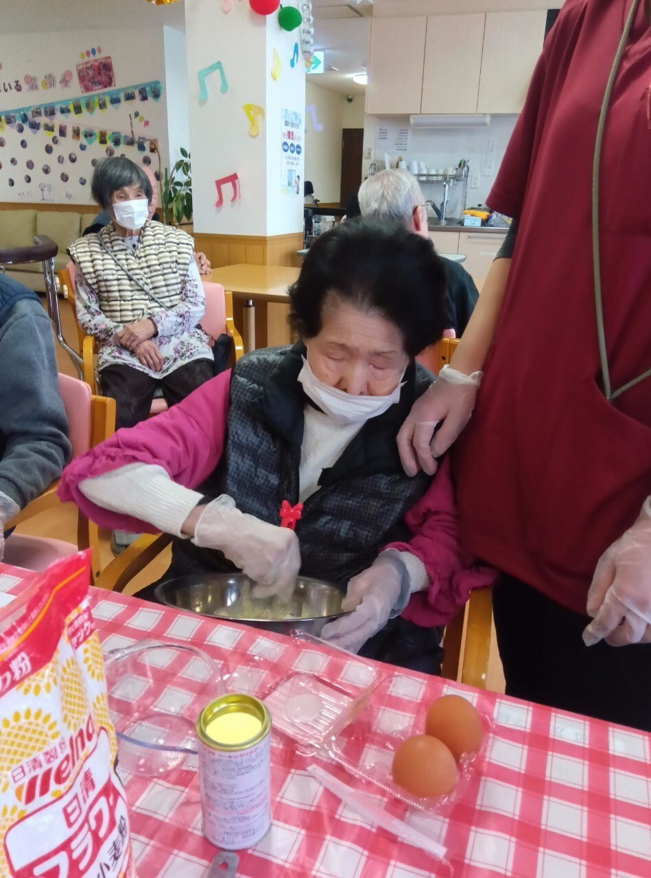 写真：利用者様とスタッフ