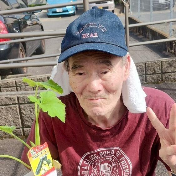 写真：利用者様とスタッフ