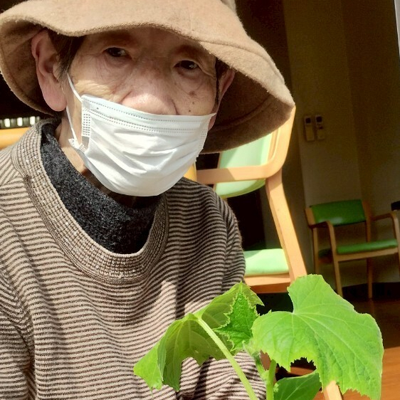 写真：利用者様とスタッフ