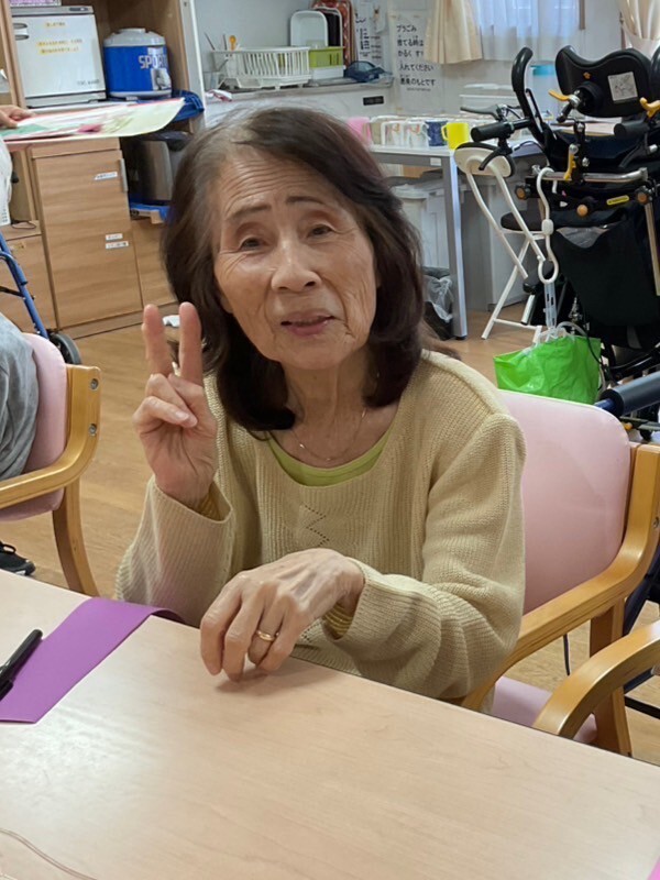 写真：利用者様とスタッフ