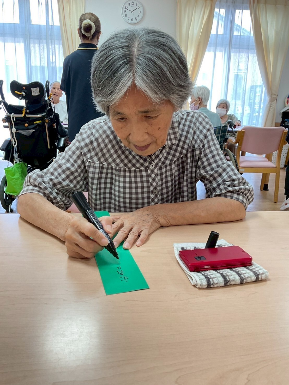 写真：利用者様とスタッフ