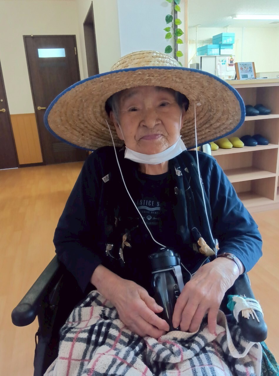 写真：利用者様とスタッフ