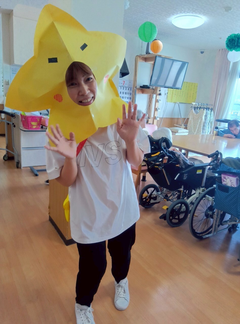 写真：利用者様とスタッフ
