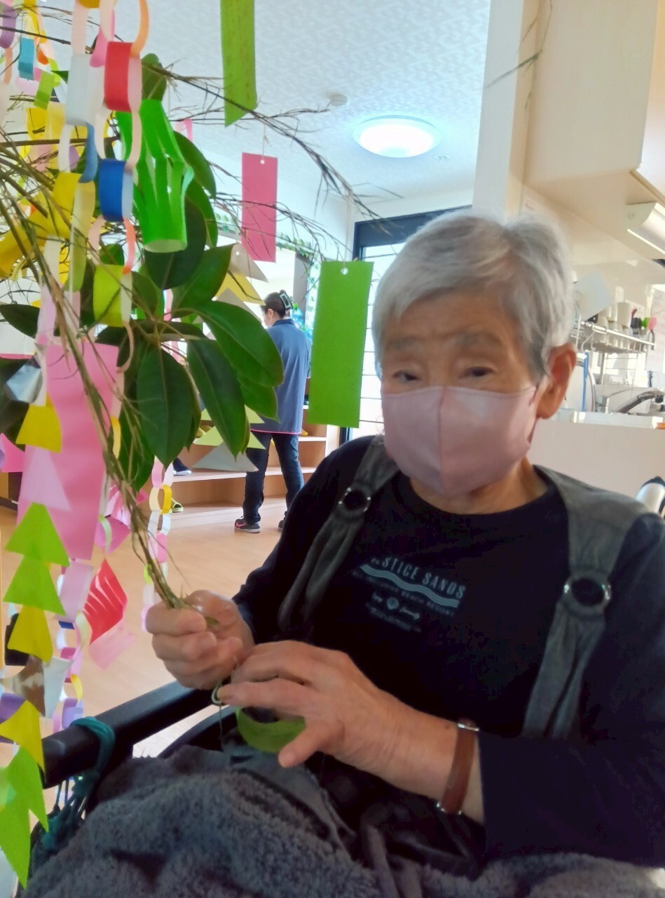 写真：利用者様とスタッフ