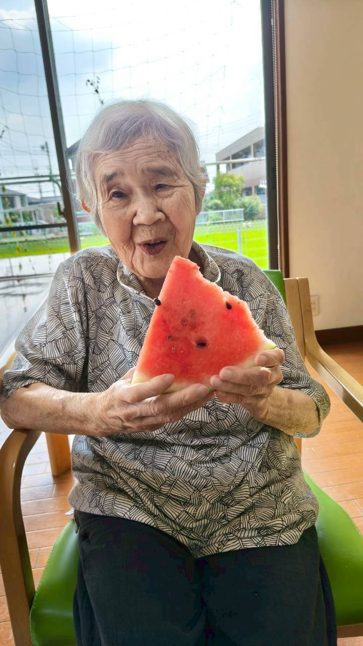 写真：利用者様とスタッフ