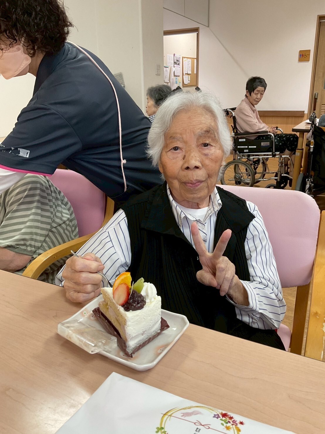 写真：利用者様とスタッフ