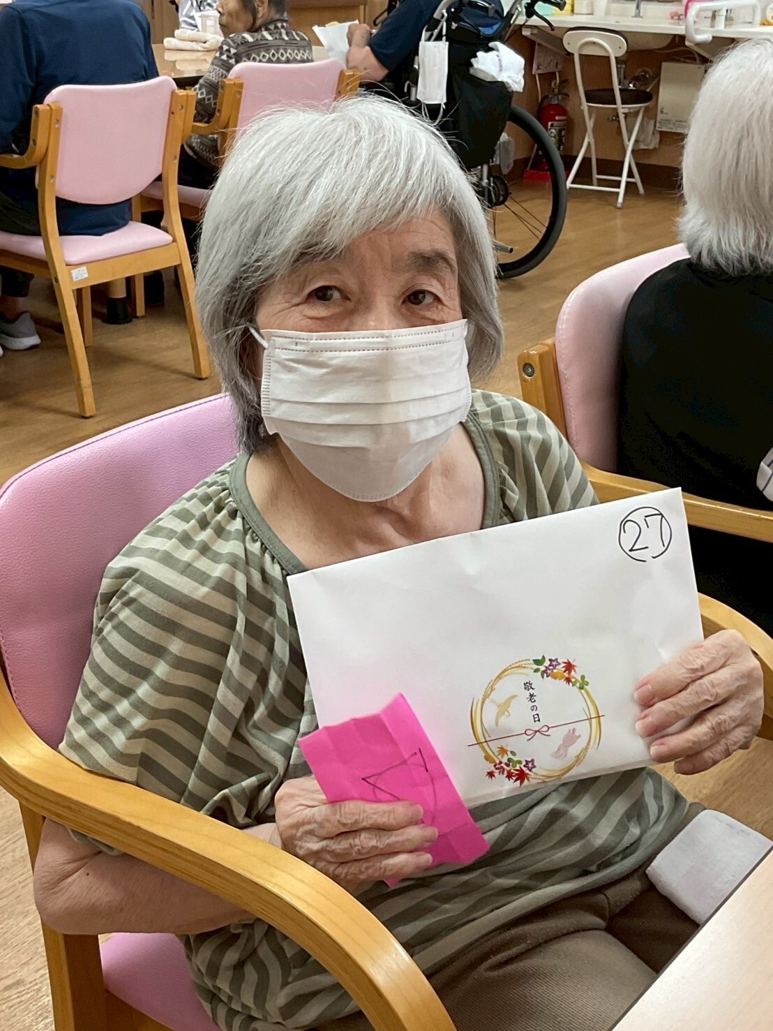 写真：利用者様とスタッフ