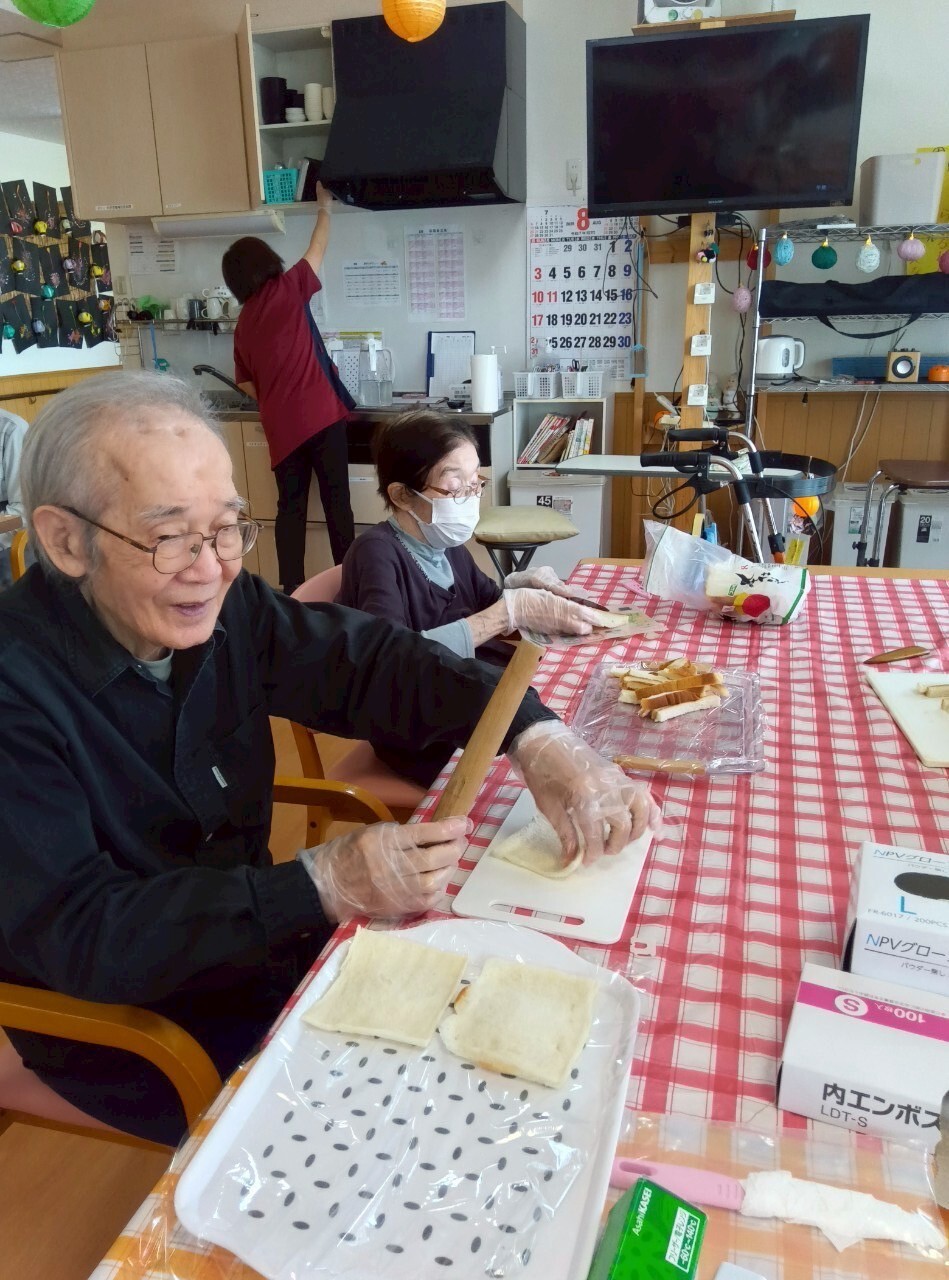 写真：利用者様とスタッフ