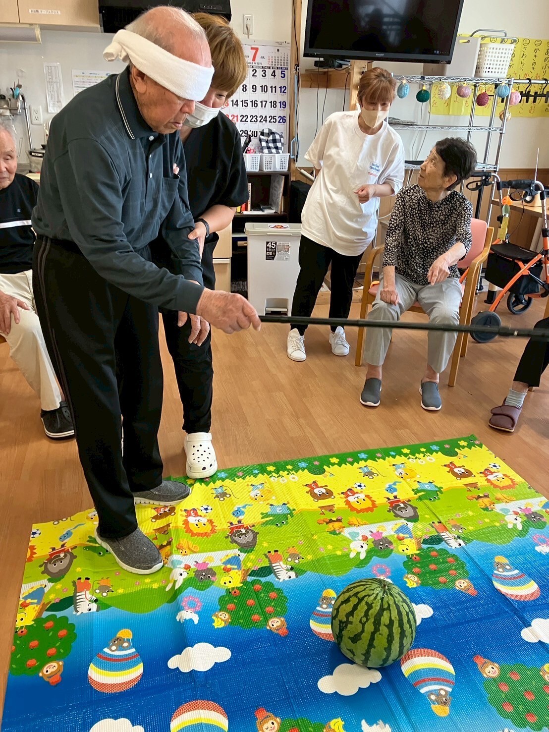 写真：利用者様とスタッフ