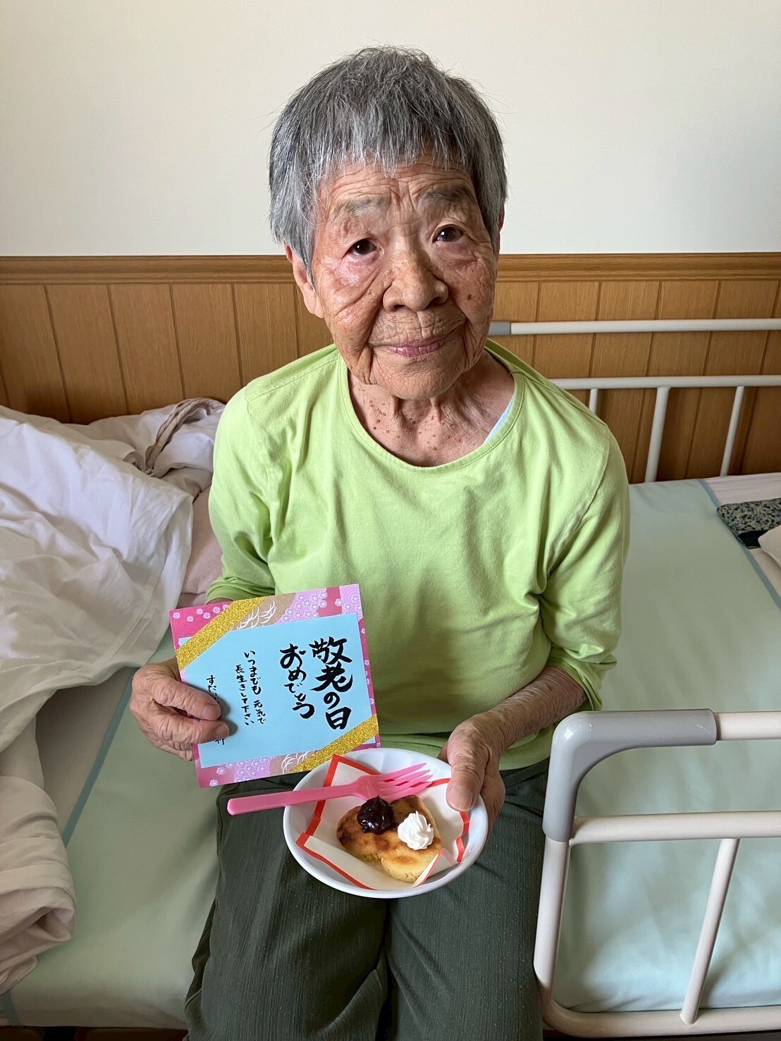 写真：利用者様とスタッフ