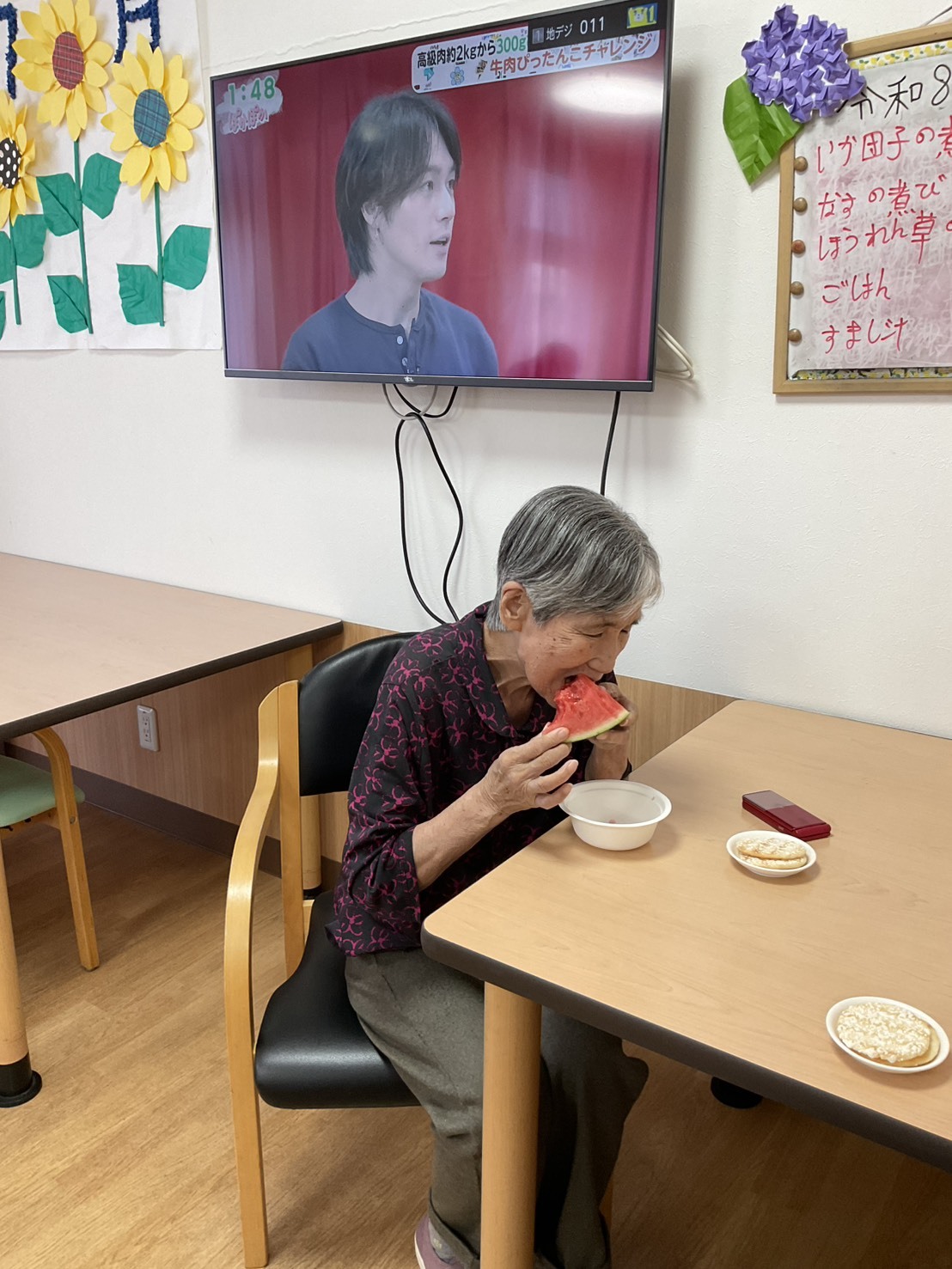 写真：利用者様とスタッフ