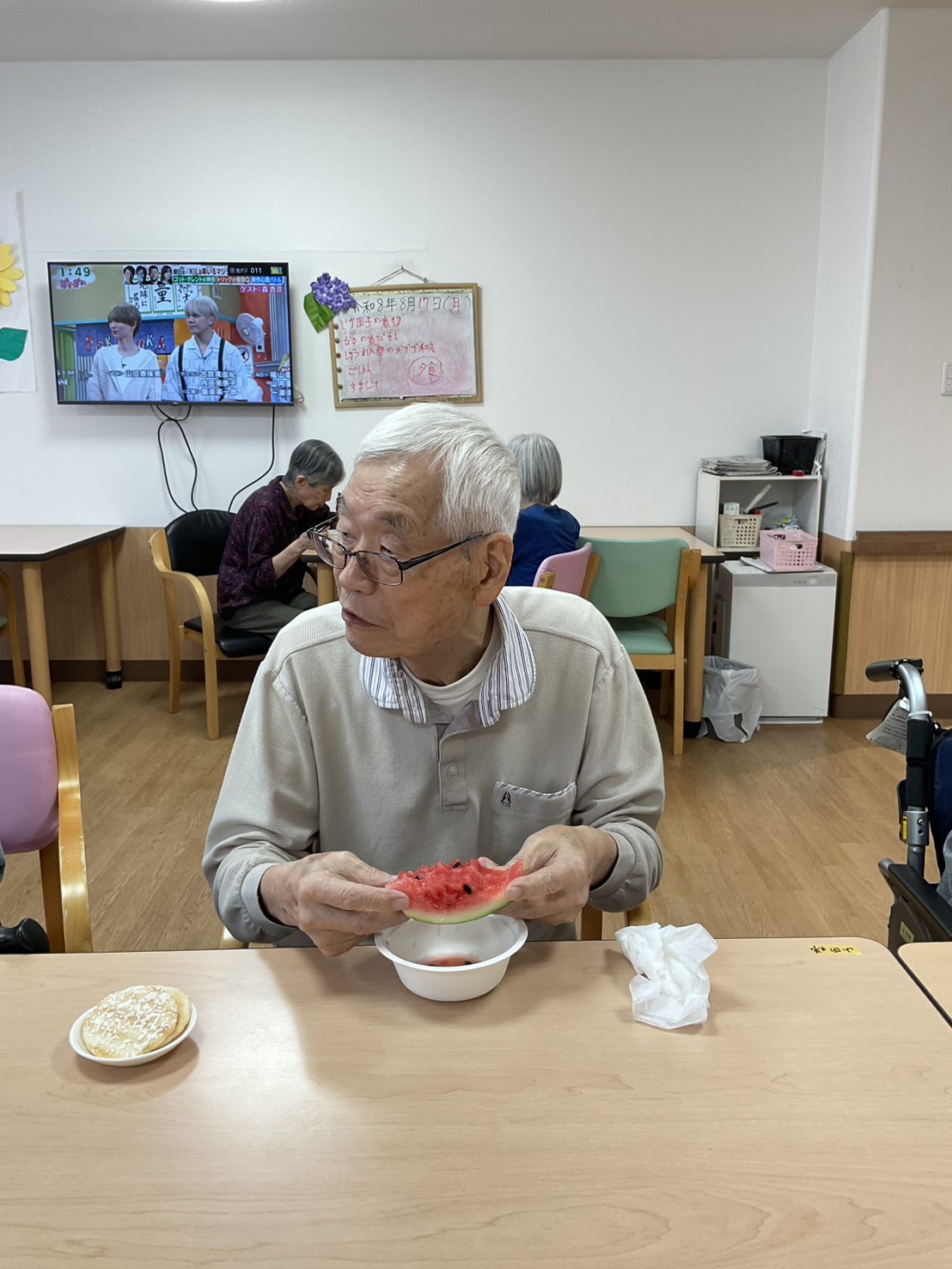 写真：利用者様とスタッフ