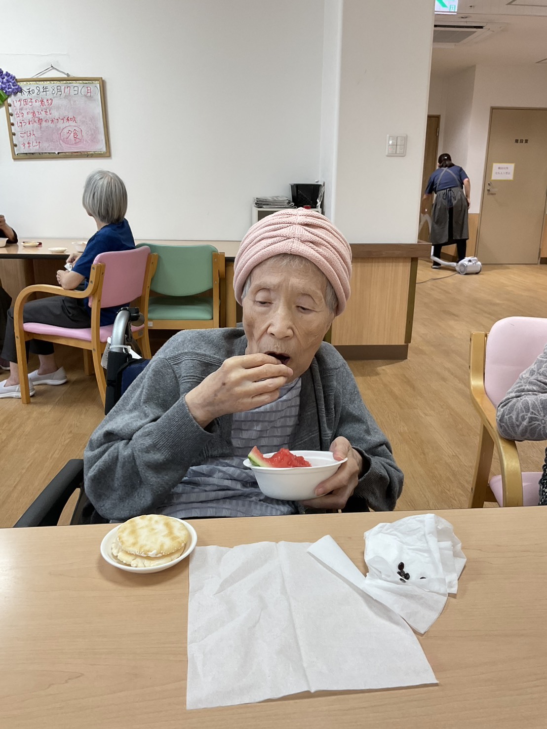 写真：利用者様とスタッフ